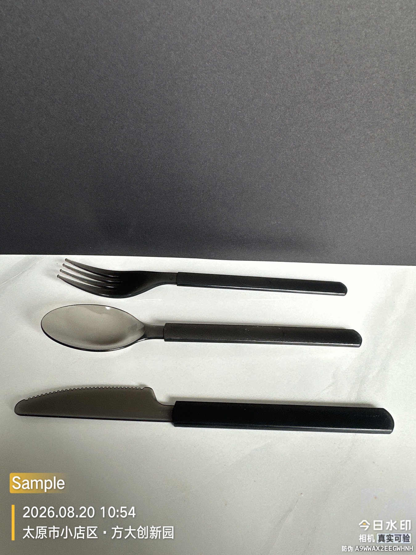 Black fork, knife, and spoon set