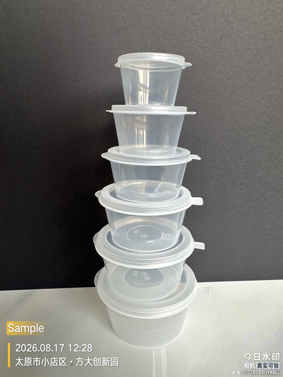Clear hinged portion cups in assorted sizes